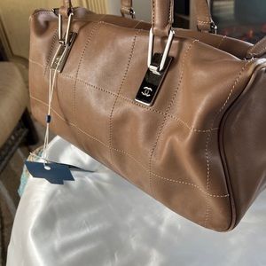 Authentic Chanel handbag, lamb skin excellent condition rare piece